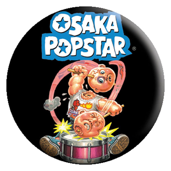Cartoon character jumps from drum with Osaka Popstar Rock’em O-Sock’em text above