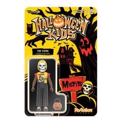 Action figure of Misfits Halloween Kids character in black t-shirt, gray pants, packaged